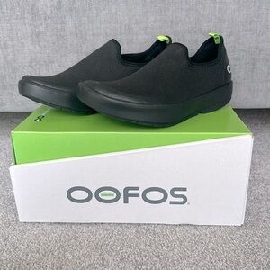 OOFOS Black Slip-On Shoes with Green Accents